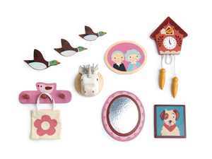 Add delightful character to your miniature home with the Doll House Wall Decor set from Tender Leaf Toys. This charming collection features wooden accessories in pink and brown tones, including flying ducks, a cuckoo clock, animal faces, an oval mirror, and a tote bag on a hook—perfect for decorating any dolls house.