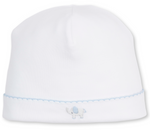 The Kissy Kissy Baby SCE Jungle Hang Out Hat is crafted from soft Peruvian cotton, featuring a light blue trim and a small hand-embroidered elephant near the bottom edge.