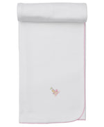 The Kissy Kissy Premier Noah's Ark Blanket with Hand Emb. is a white Pima cotton baby blanket, rolled at the top, featuring pink trim and a small embroidered Noah's Ark design near one corner.