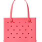 The Baby Bogg® Bag by Bogg Bags is a pink tote featuring two handles and evenly spaced holes along its sides for a blend of style and functionality. With the brand name “Bogg” embossed on the lower right corner, this customizable bag is both washable and durable, making it ideal for everyday adventures.