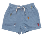 The Boys’ Calvin Short from Pink Chicken is a light blue cotton short with a drawstring waist, accented by colorful surfboard embroidery—ideal beachwear for little adventurers.