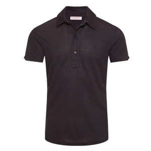 The Orlebar Brown Sebastian Linen Polo is a tailored-fit men’s shirt in plain black, featuring short sleeves, a collar, and a three-button placket, shown against a white background.