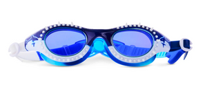 The Bling2O Kids' Shark Surge Goggles feature a playful shark-inspired design with blue lenses, white spikes along the frame, and an adjustable strap, making them the perfect goggles for kids to enjoy fun in the pool.