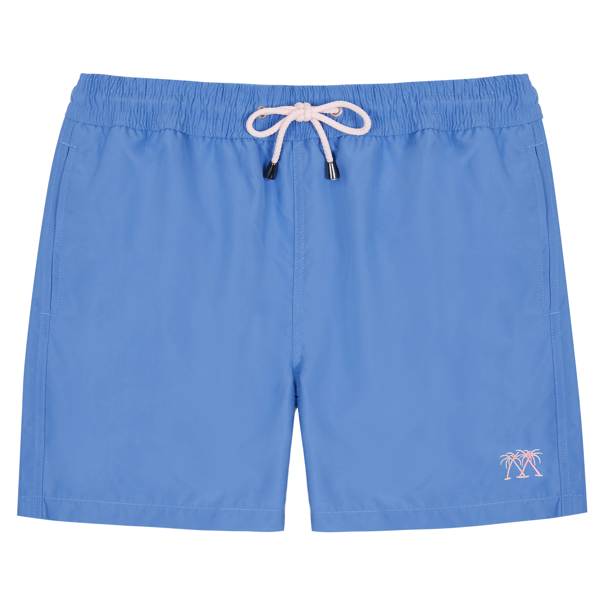 The Mens Plain Trunks by Pink House Mustique are blue swim trunks with an elastic waistband, white drawstring, and a small palm tree embroidery on the lower left leg. They feature a Velcro back pocket and are shown against a white background.