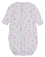The Kissy Kissy Baby Just Giraffes Printed Convertible Gown features a charming pink giraffe print on soft white Pima cotton, with long sleeves for added warmth. Designed for ultimate baby comfort, this versatile gown includes a simple front closure and elasticized bottom hem, making diaper changes easy while keeping your little one snug.
