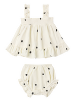 The Rylee & Cru Baby Girls' Lala Set features a white sleeveless top and matching flutter bloomers with black polka dots and smocked ruffle details for a charming look.