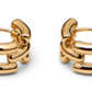 A pair of chunky, circular gold Johanna Earrings by Lie Studio featuring a stacked, segmented design on a white background—ideal for everyday wear.