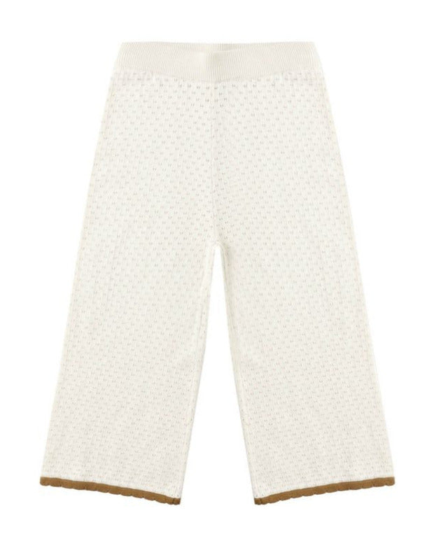 The Girls' Pointelle Knit Pant by Rylee & Cru features a subtle dotted texture, elastic waistband, and brown hem trim, shown photographed on a plain background.