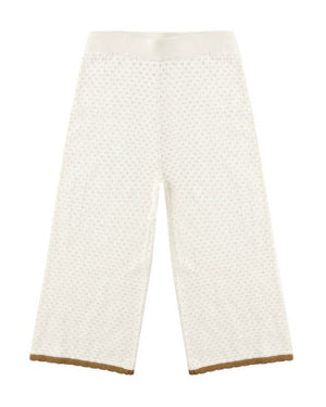 The Girls' Pointelle Knit Pant by Rylee & Cru features a subtle dotted texture, elastic waistband, and brown hem trim, shown photographed on a plain background.