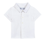 The Tartine et Chocolat Baby Boys’ and Boys’ Linen Collared Shirt, shown front-facing on a plain background, is a short-sleeve white linen shirt that offers timeless elegance for special occasions or everyday wear.