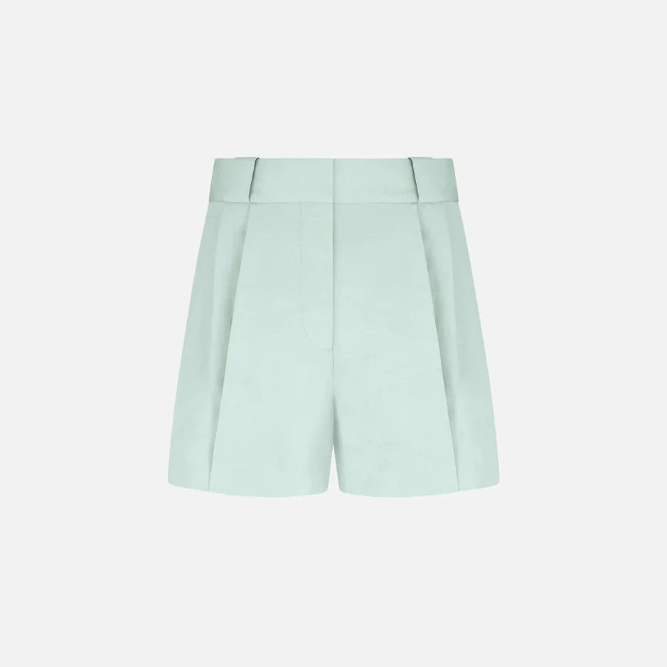 The Zenith Selle Shorts by Blaze Milano feature a light blue, high-waisted design with front pleats and wide belt loops, highlighting expert tailoring—ideal for your 2026 resort wardrobe. Shown against a plain white background.