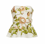 The Cara Cara Tilda Top is a strapless peplum style with a sweetheart neckline, boning tape, floral print, and a wide belted waist with a round woven buckle, shown on a white background.