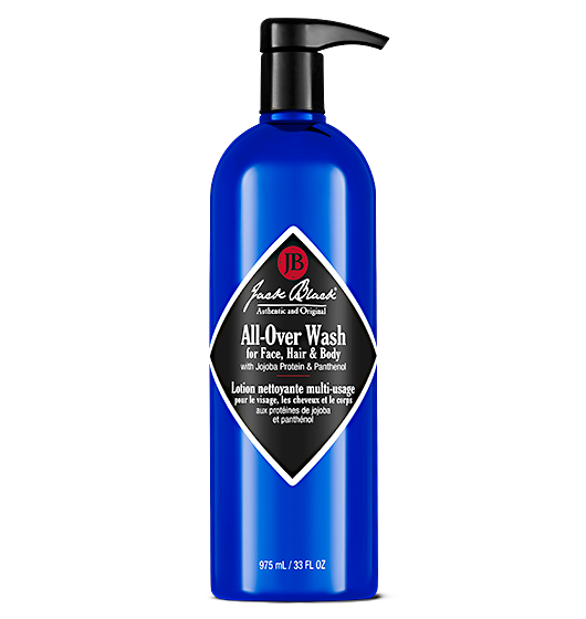 A 975 ml (33 fl oz) blue bottle of Jack Black All-Over Wash, a sulfate-free, English and French labeled face, hair, and body wash with pump dispenser.