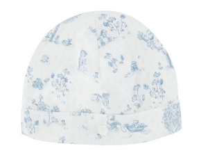 The Tartine et Chocolat Baby Fantasy Garden Cotton Beanie is crafted from soft white cotton and showcases a light blue floral and animal fantasy garden print, finished with a small button detail on the folded brim.
