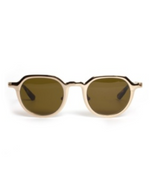 The Galvan Sunglasses by Krewe feature round beige frames and dark lenses, offering a modern look. They are displayed front-facing against a plain white background.