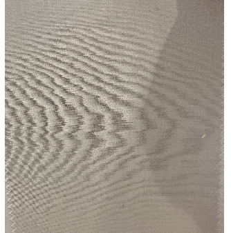 Close-up view of wavy zigzag patterns on light gray textured fabric from Samuelsohn Slim Fit Flat Front Wool Pants, featuring a subtle moiré effect.