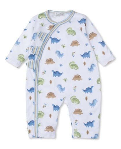 The Kissy Kissy Baby Boys' Dinosaur Domain Playsuit features a white base with blue, green, and brown dinosaur prints, diagonal striped trim, side snap closure, and is crafted from soft Pima cotton for comfort.