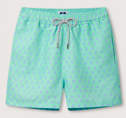 Love Brand's Staniel Swim Trunk features light green swim shorts with a subtle blue diamond pattern, an elastic waistband, and a white drawstring. Made from recycled materials, these quick-dry trunks ensure all-day comfort by the water.