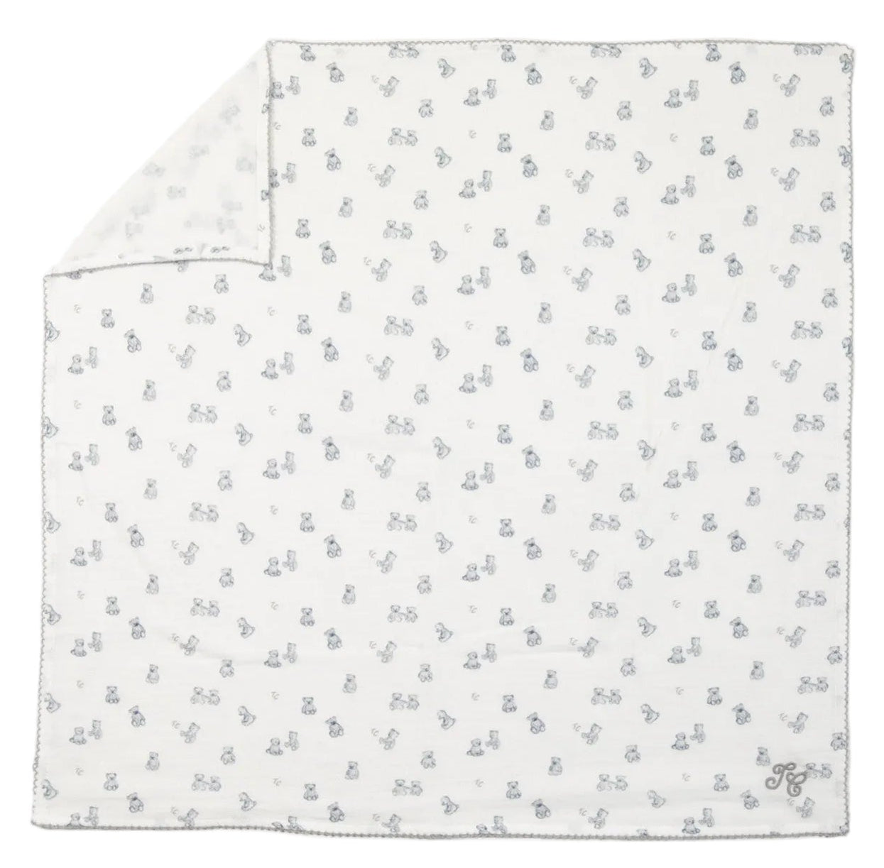 Tartine et Chocolat Cotton Swaddle in white features a subtle gray animal print and neatly stitched edges, with one corner folded to reveal the reverse side—an adorable and cozy nursery essential.