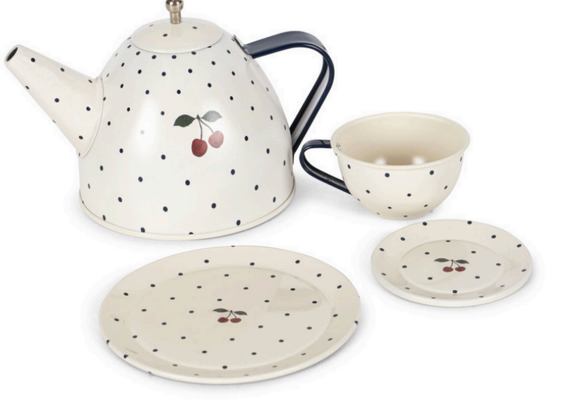 Konges Slojd Blue Dot Tea Party Set including an off-white teapot, teacup, saucer, and small plate decorated with blue polka dots and cherry illustrations.