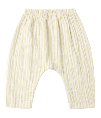 The Rylee & Cru Baby Rowan Pant is a light yellow woven cotton children's pant featuring an elastic waistband and subtle vertical stripes, shown laid flat on a white background.