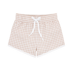 The Minnow Boy's Boardie, by the brand Minnow, are beige and white checkered shorts designed with a white drawstring and an elastic waistband. These shorts focus on providing comfort and mobility for boys' style. Ideal to pair with a UPF 50+ rashguard, they are showcased against a simple background.