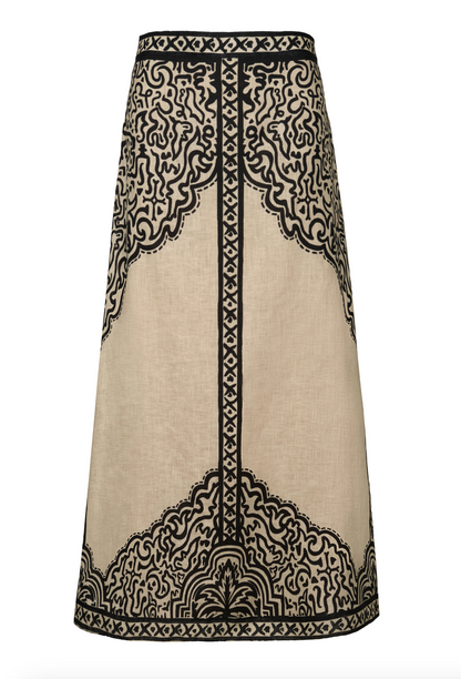 Johanna Ortiz Loose Horizon Ankle Skirt in beige, featuring an A-line silhouette, a black decorative border, and an intricate abstract print.