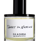 The D.S. & DURGA Sweet Do Nothing 50ML eau de parfum by D. S. & Durga comes in a clear glass bottle carrying hints of orange blossom, filled with 50 ml of light yellow liquid, topped with a black cap and adorned with a white label.