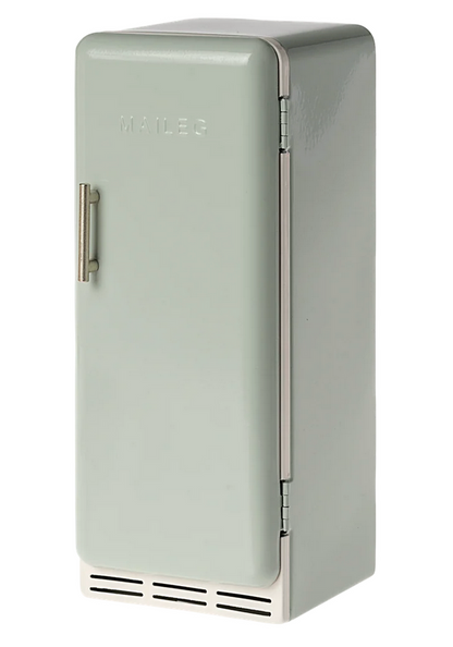 The Maileg Miniature Fridge is a small, mint green, vintage-style metal fridge featuring a single door and the Maileg name embossed on the front—an ideal dollhouse accessory or toy refrigerator to inspire imaginative play.